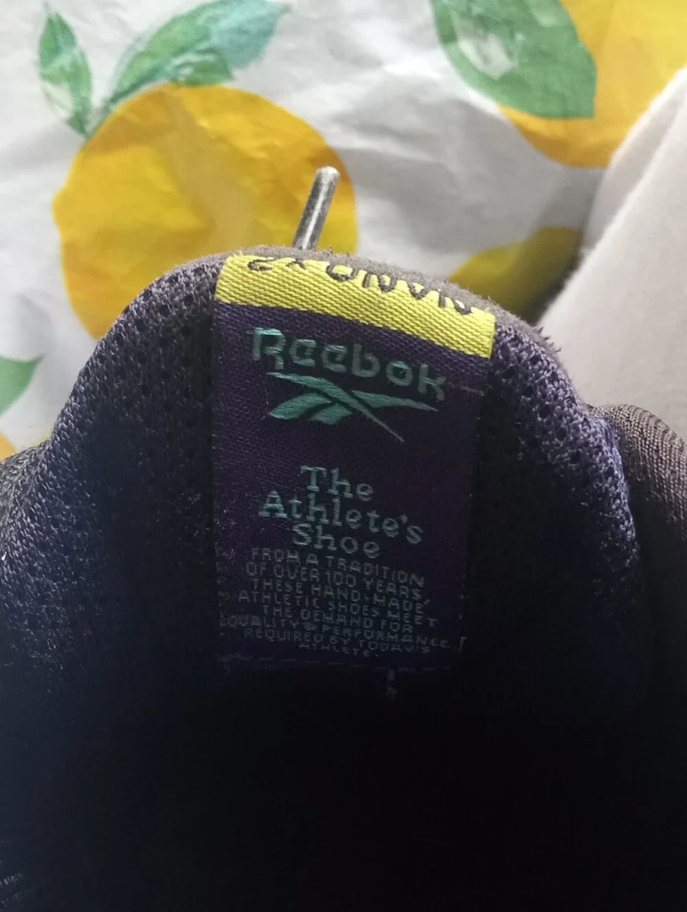 Reebok Black Sneakers with Teal Logo and Yellow Tab